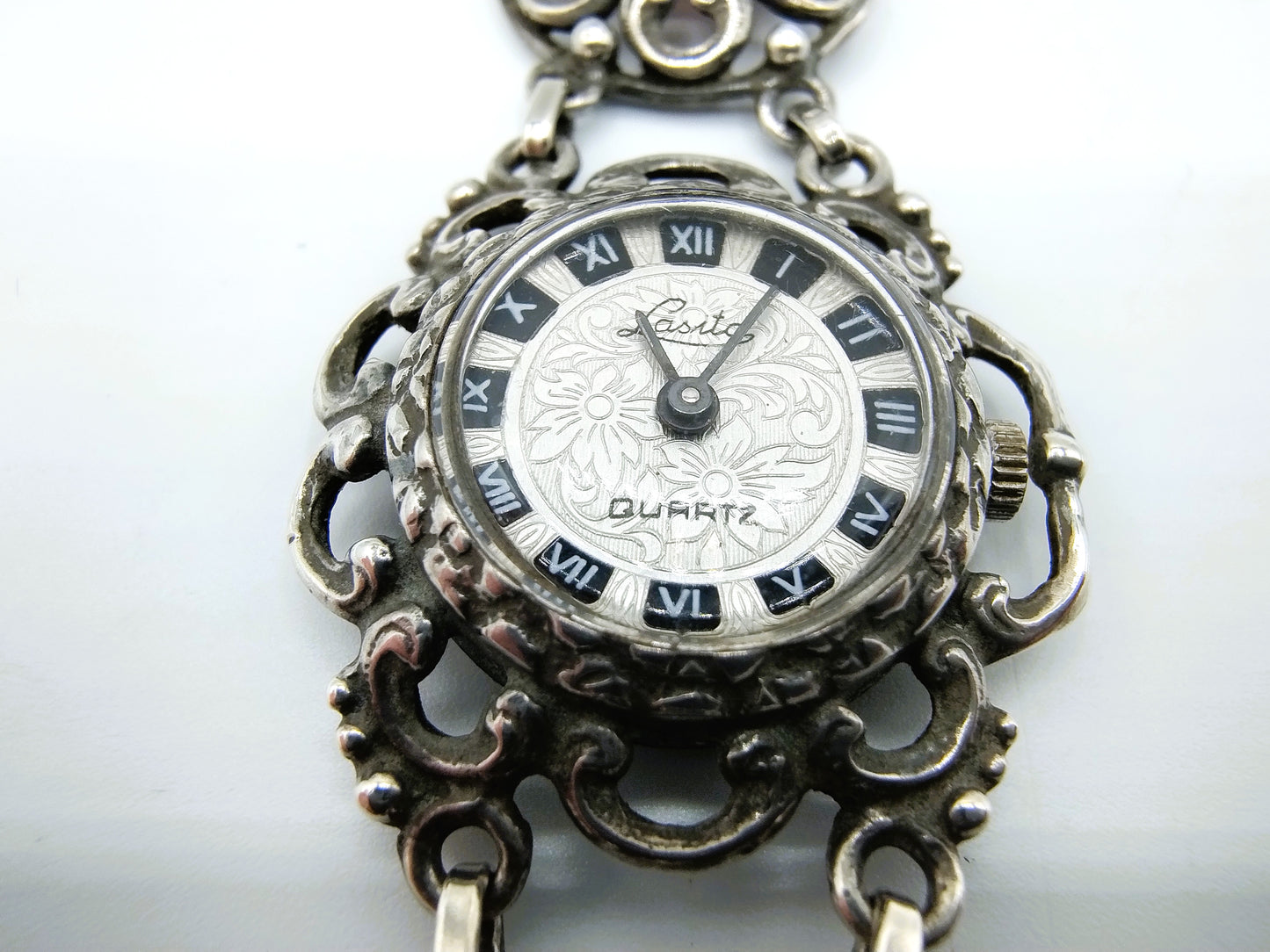Zilveren dameshorloge, Lasita Quartz, 16 cm + zilveren ring met granaat, 18 mm