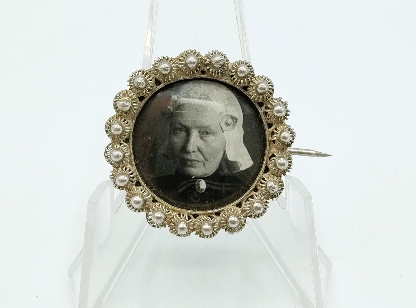 Silver brooch with Frisian lady in traditional costume