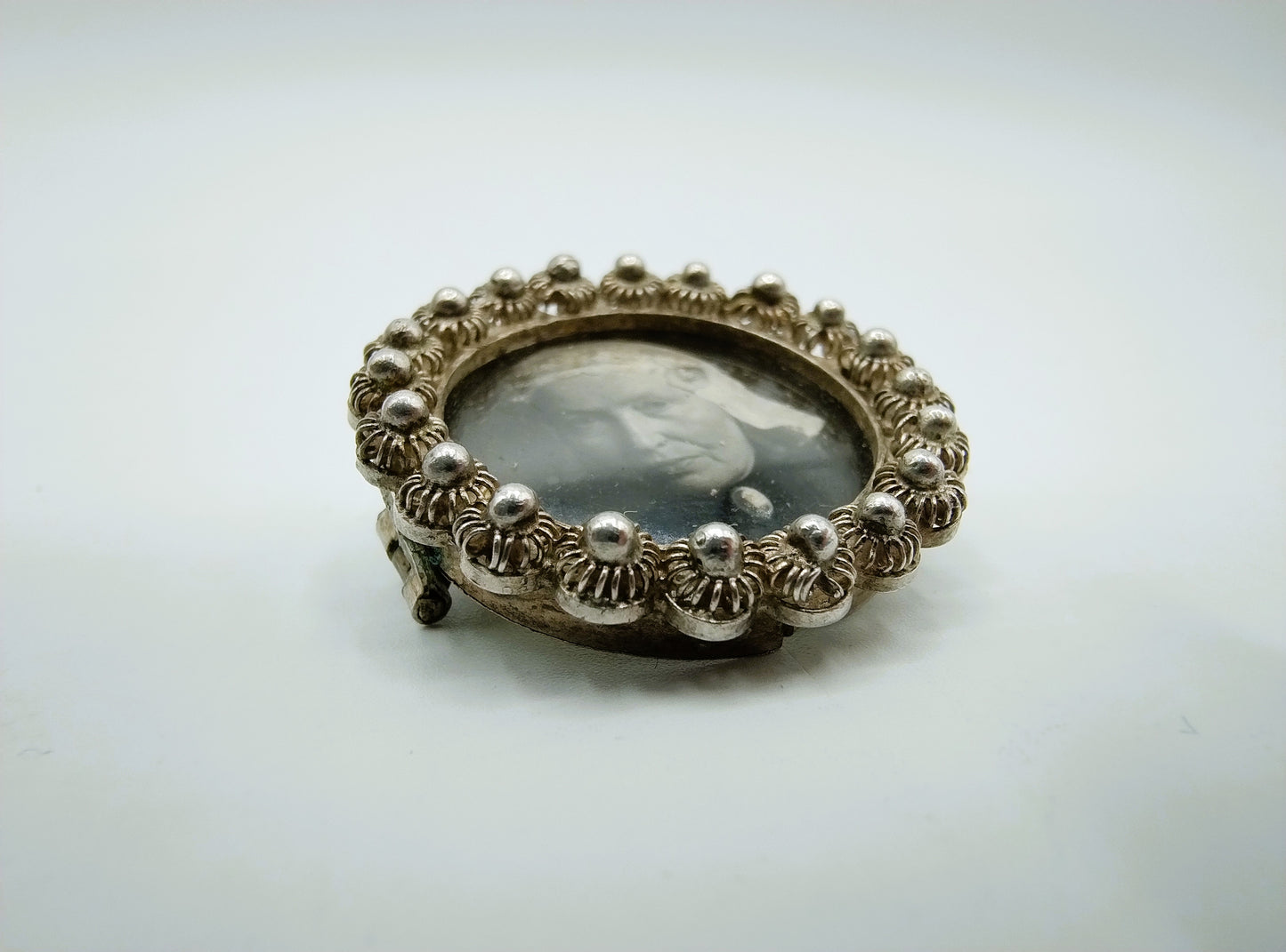 Silver brooch with Frisian lady in traditional costume