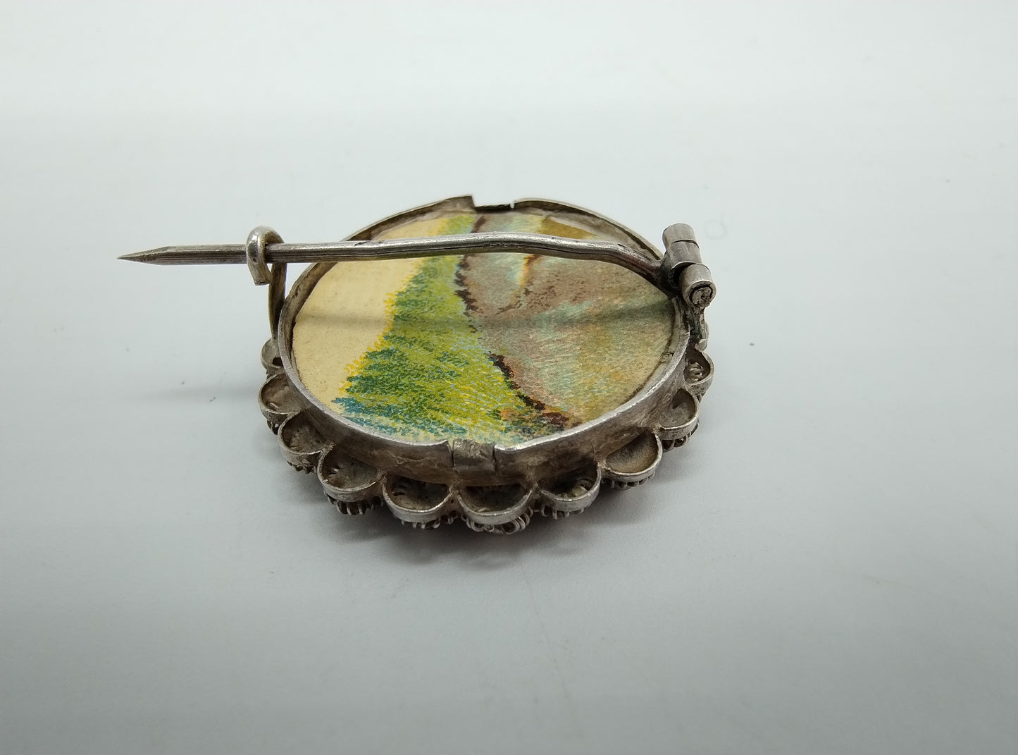 Silver brooch with Frisian lady in traditional costume