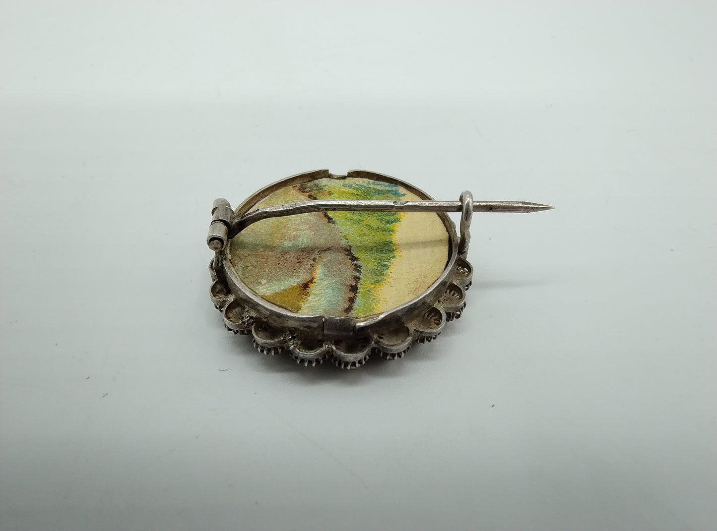 Silver brooch with Frisian lady in traditional costume