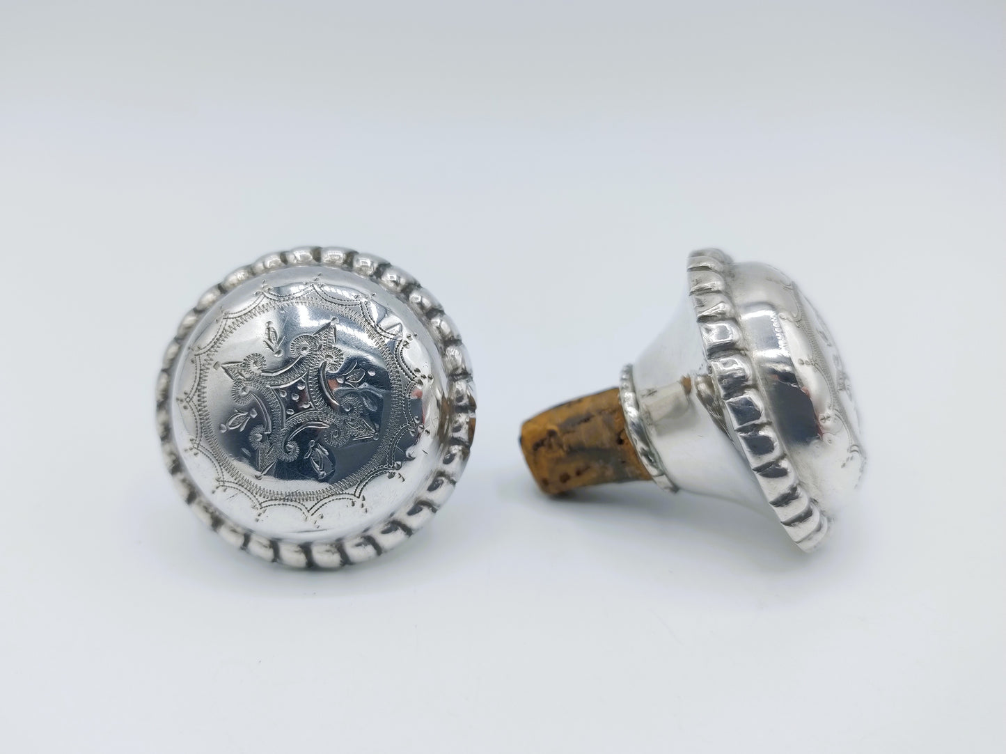 2 Silver decorative corks, 19th century