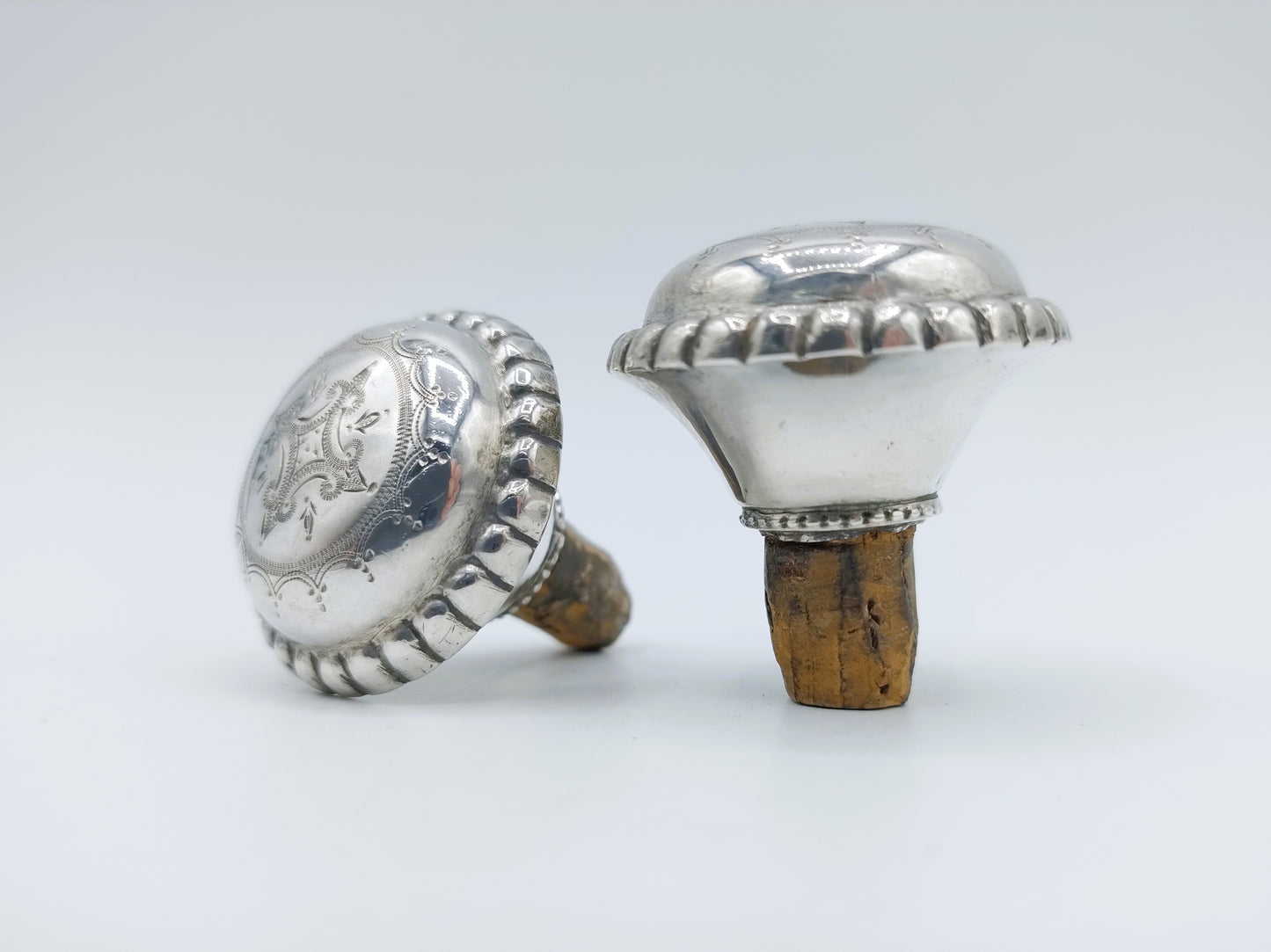 2 Silver decorative corks, 19th century