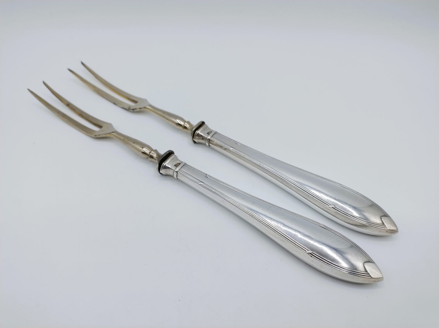 2 Gabeln mit silbernen Griffen, ca. 1915