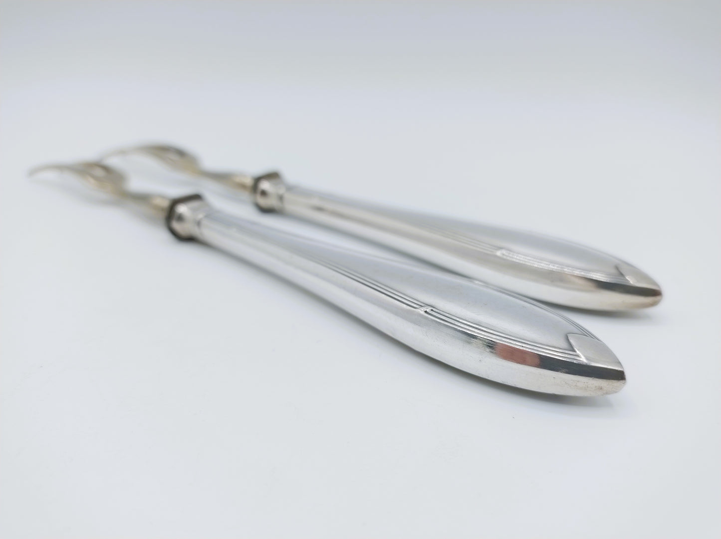 2 Gabeln mit silbernen Griffen, ca. 1915