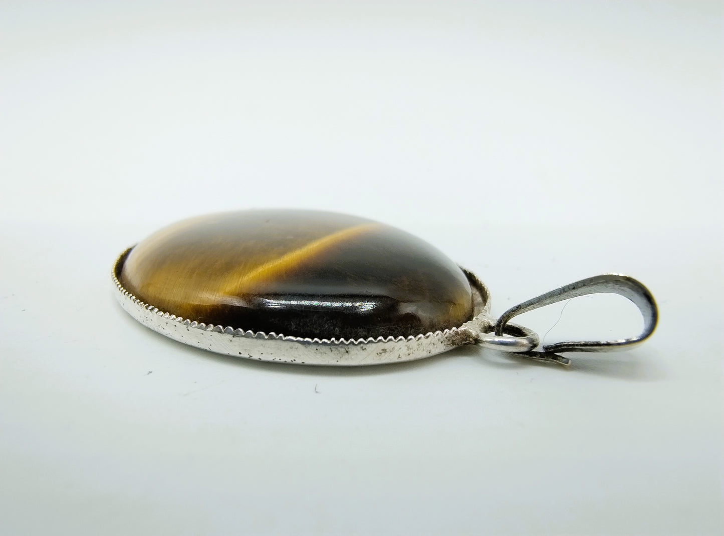 Zilveren hanger met tijgeroog