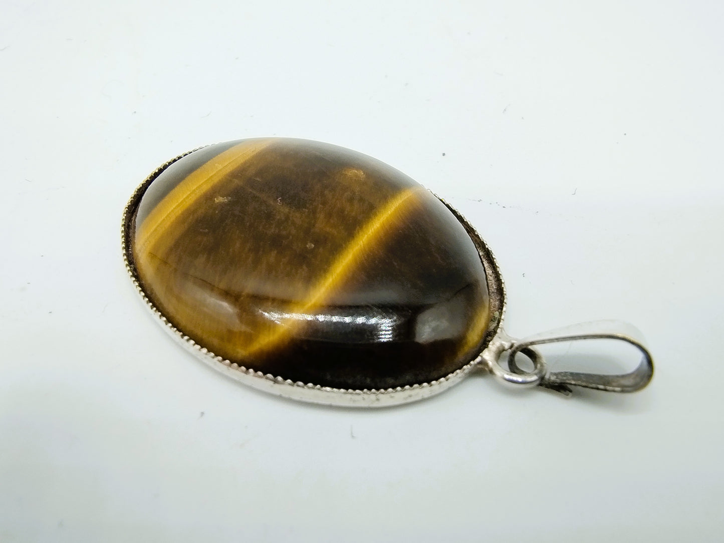 Zilveren hanger met tijgeroog
