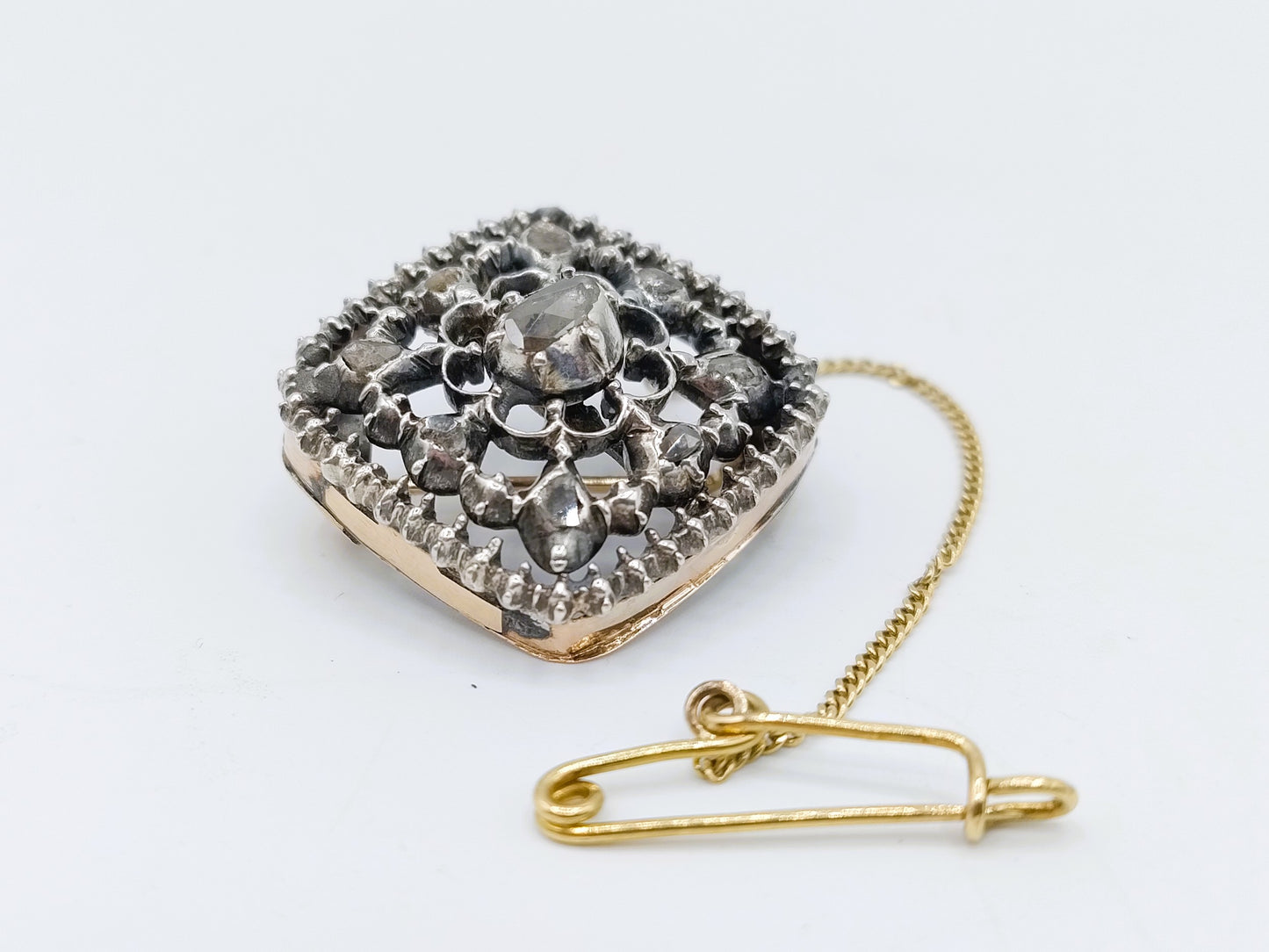 Gold brooch set with 9 rose diamonds in silver, 19th century