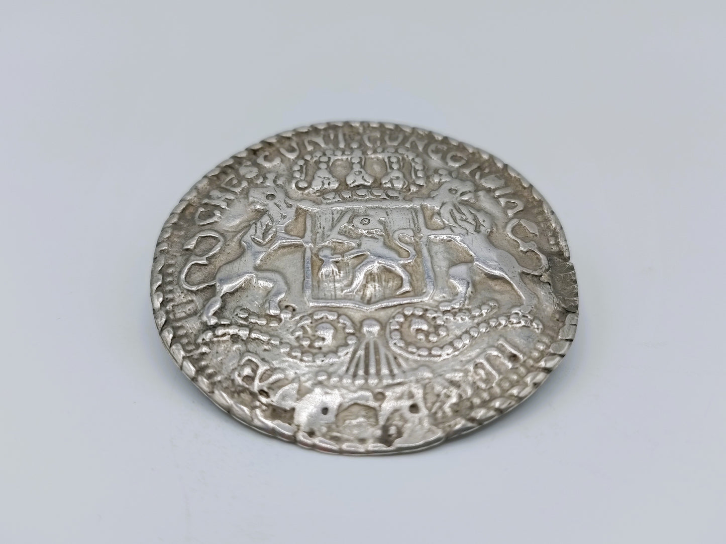 Silver trouser button brooch, 1865