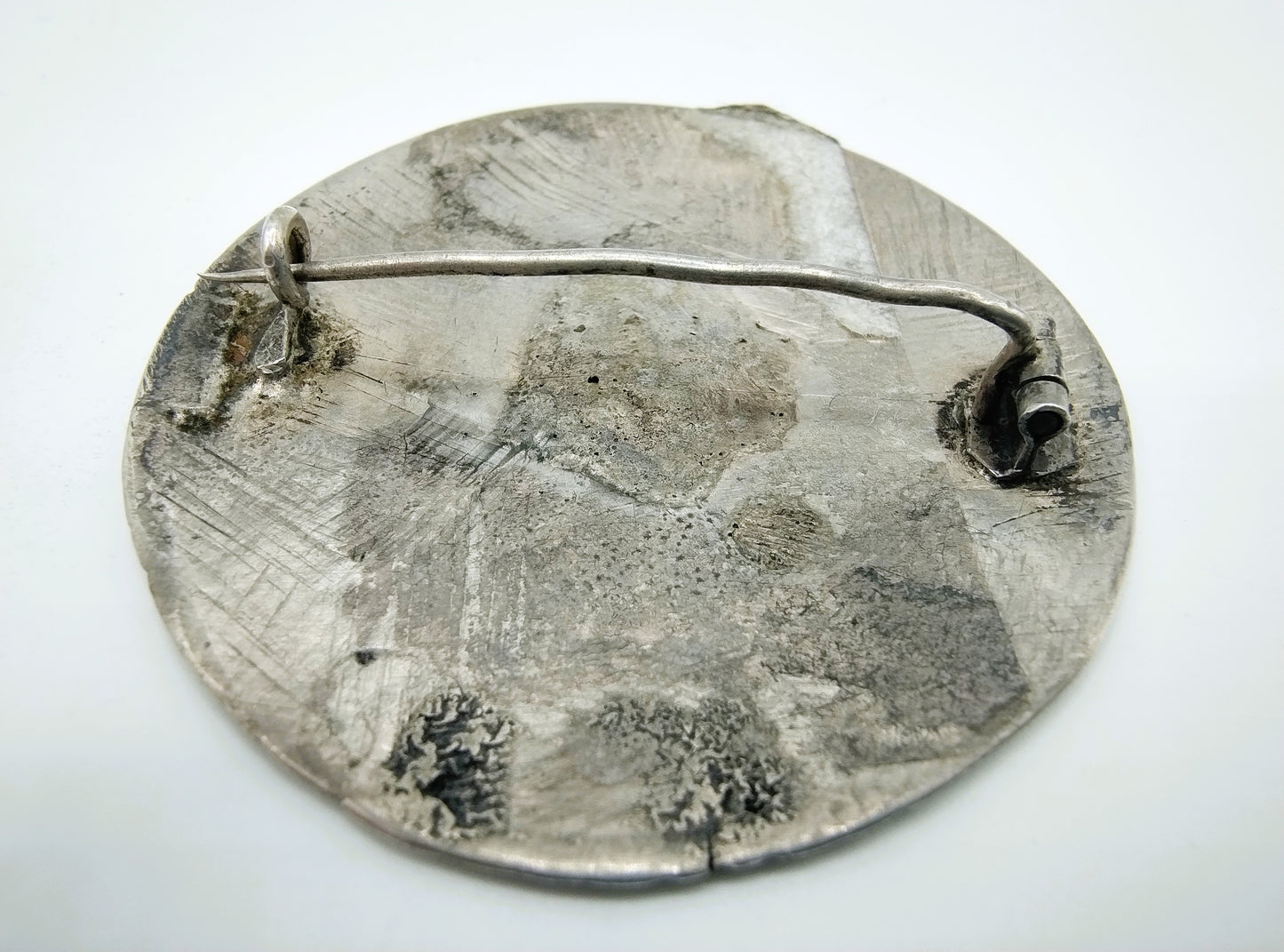 Silver trouser button brooch, 1865