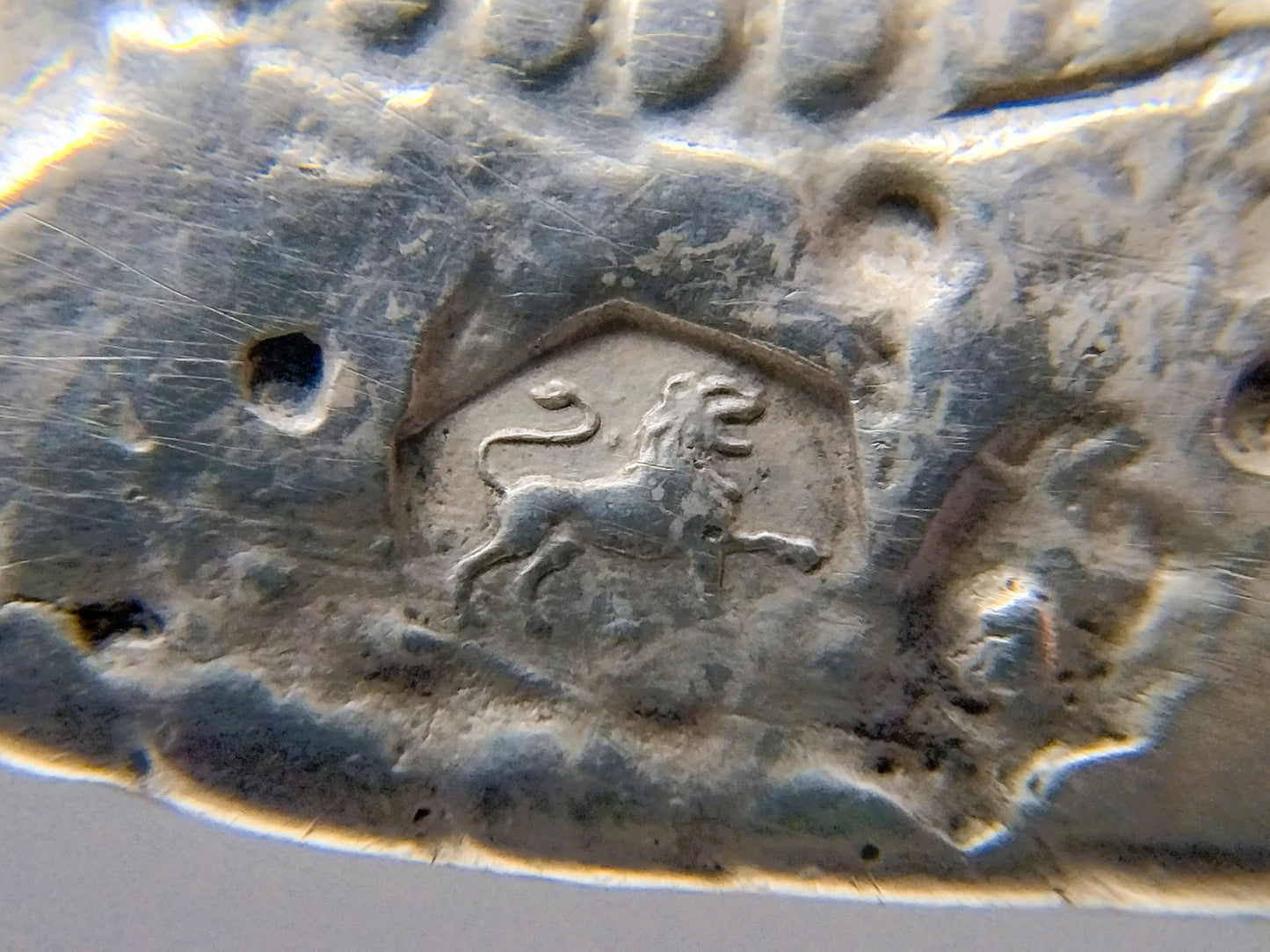 Silver trouser button brooch, 1865