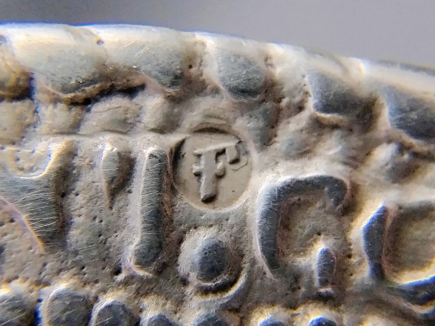 Silver trouser button brooch, 1865