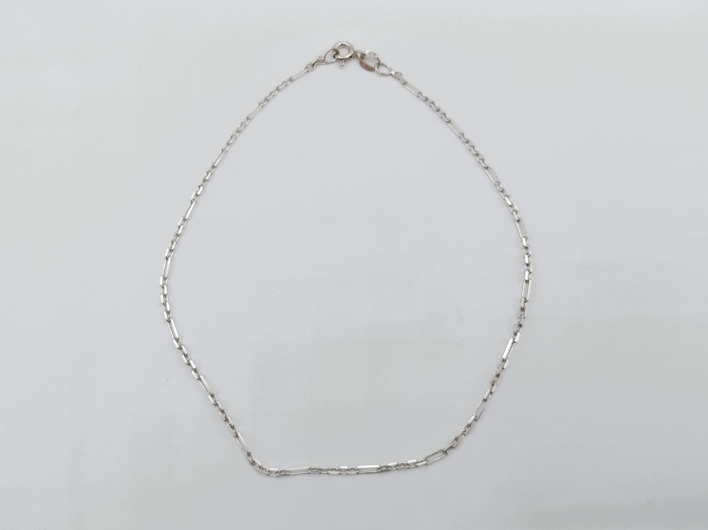 Zilveren enkelbandje F- Anker, 25 cm