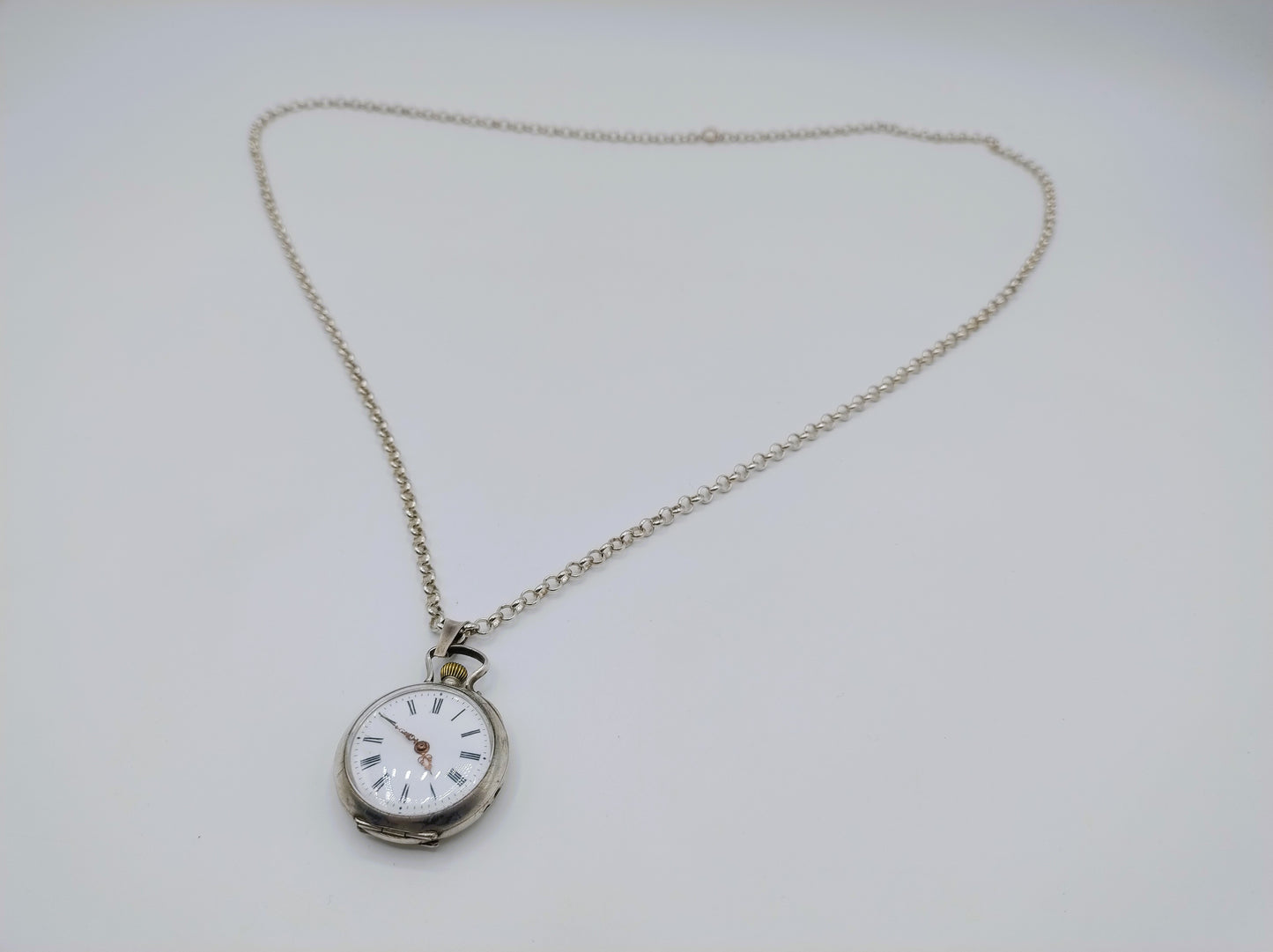 Zilveren jasseronketting met zilveren horloge hanger, 81 cm.