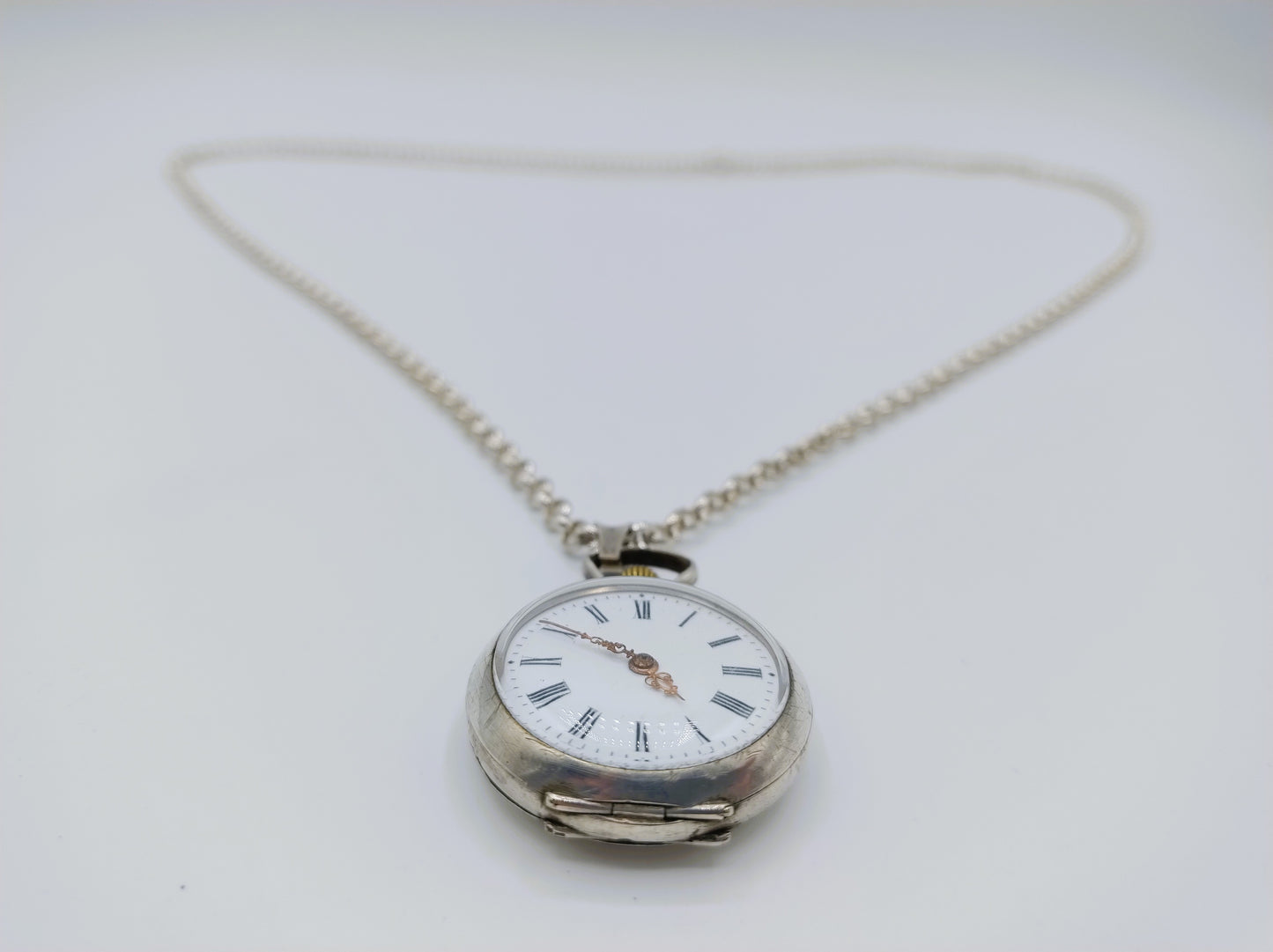 Zilveren jasseronketting met zilveren horloge hanger, 81 cm.