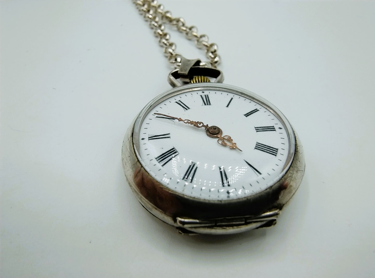 Zilveren jasseronketting met zilveren horloge hanger, 81 cm.