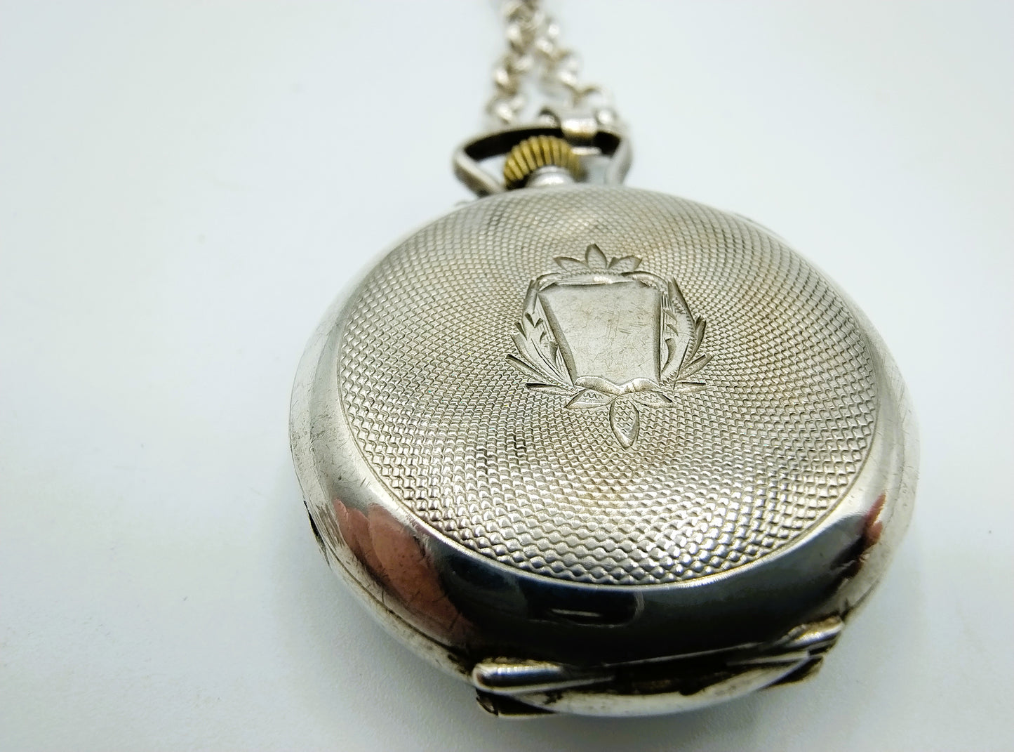 Zilveren jasseronketting met zilveren horloge hanger, 81 cm.