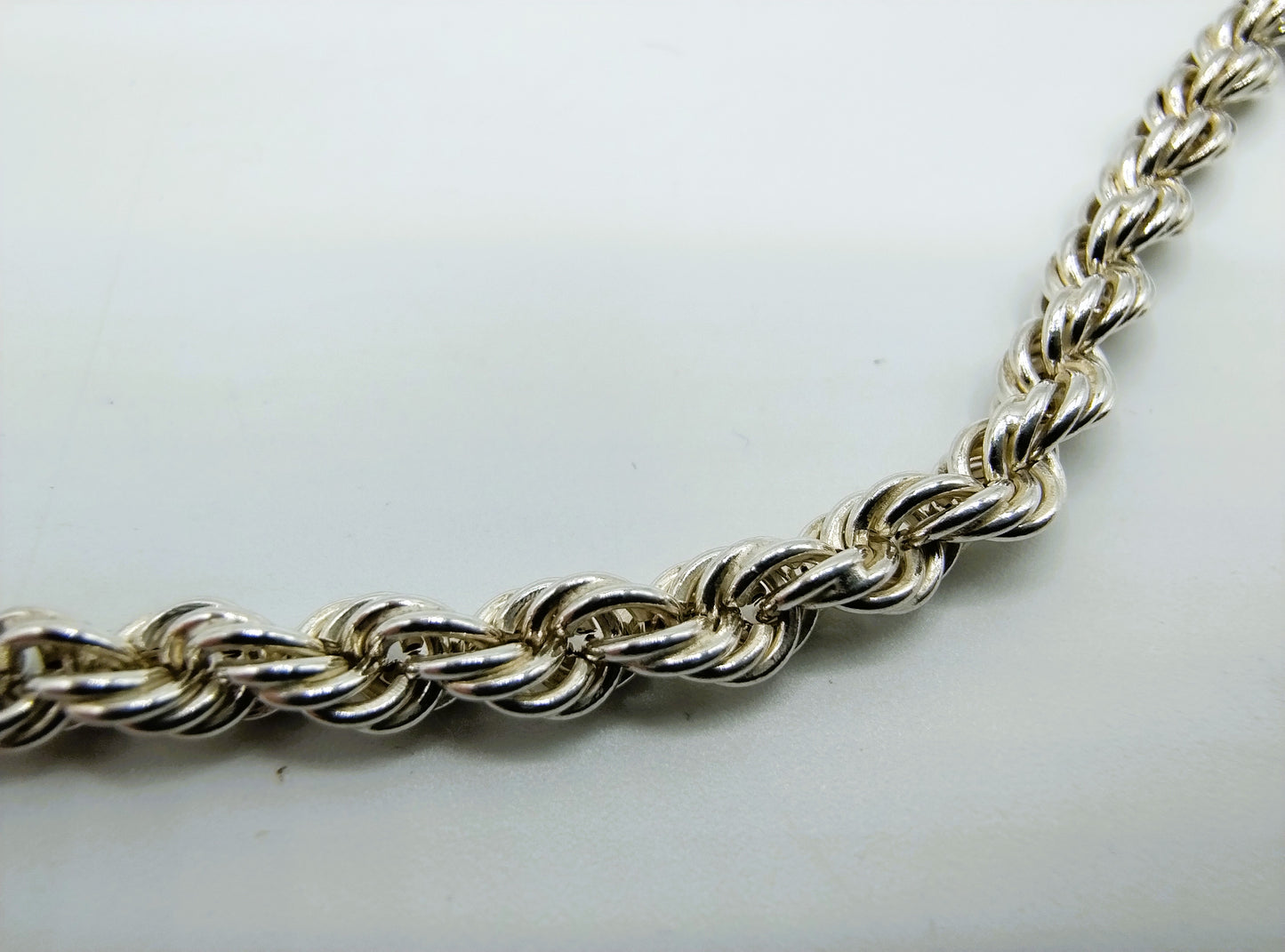 Gevlochten zilveren koordcollier, 72 cm
