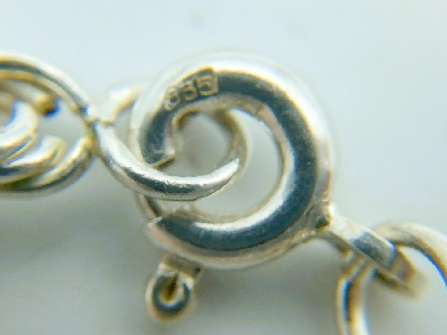 Gevlochten zilveren koordcollier, 72 cm