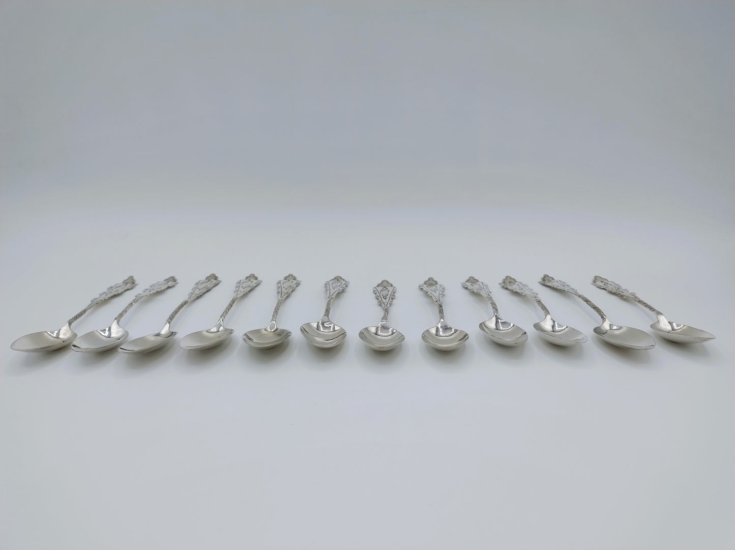 12 Zilveren theelepels, G. Huisman en G. v.d. Berg, ca. 1925