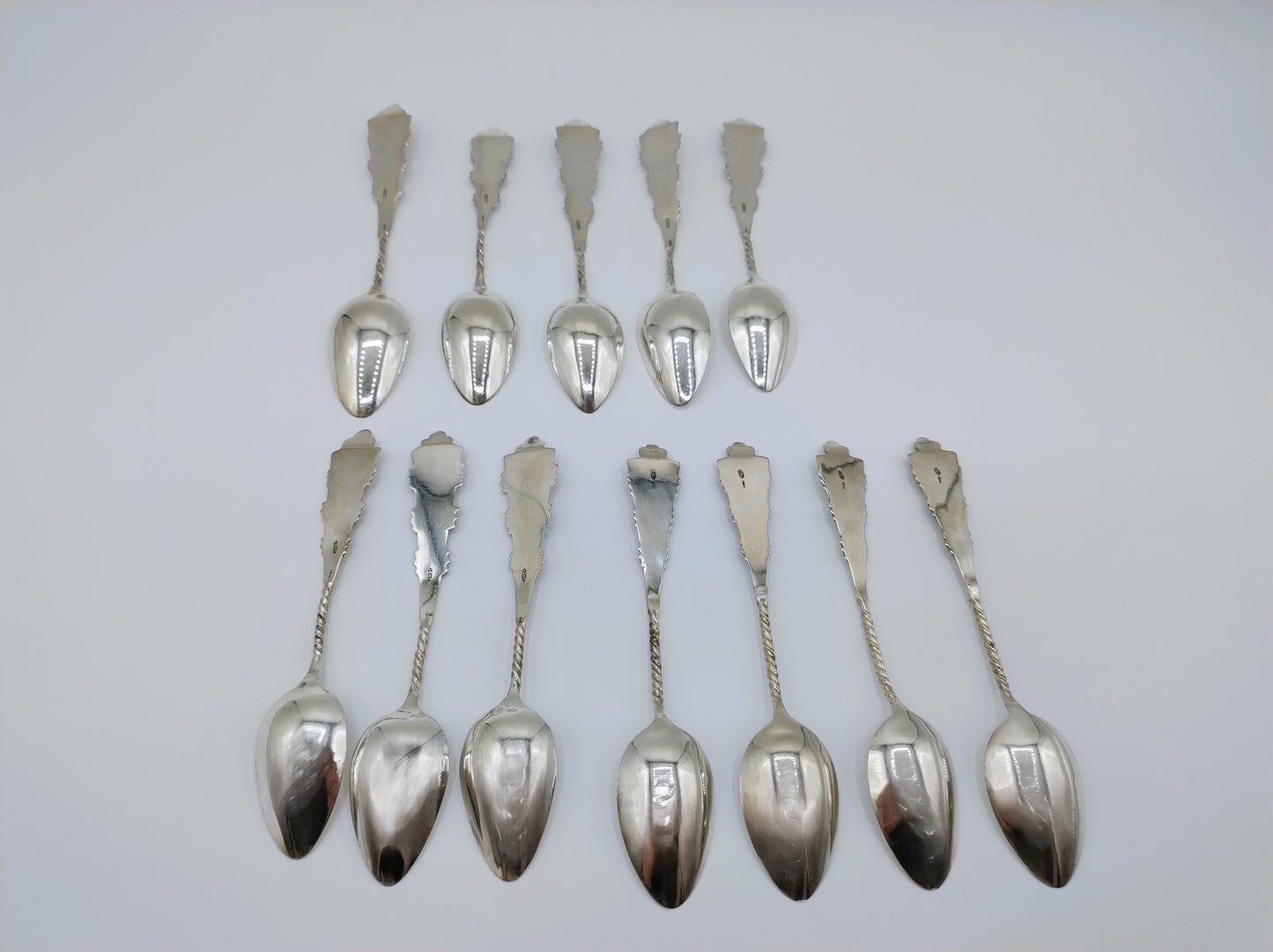 12 Zilveren theelepels, G. Huisman en G. v.d. Berg, ca. 1925