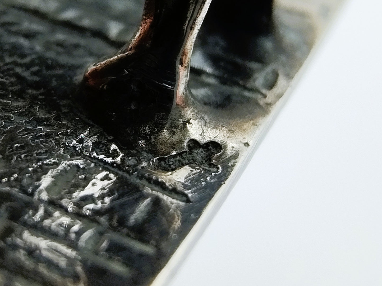 Silver miniature fabric seller