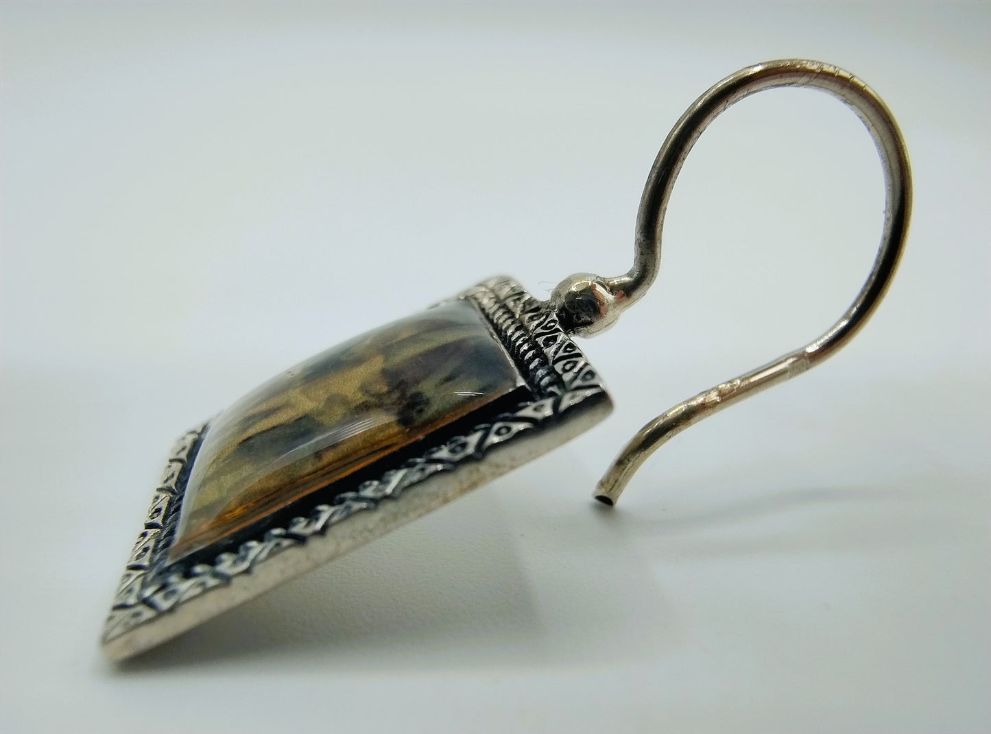 Silver earrings with an image of a painting