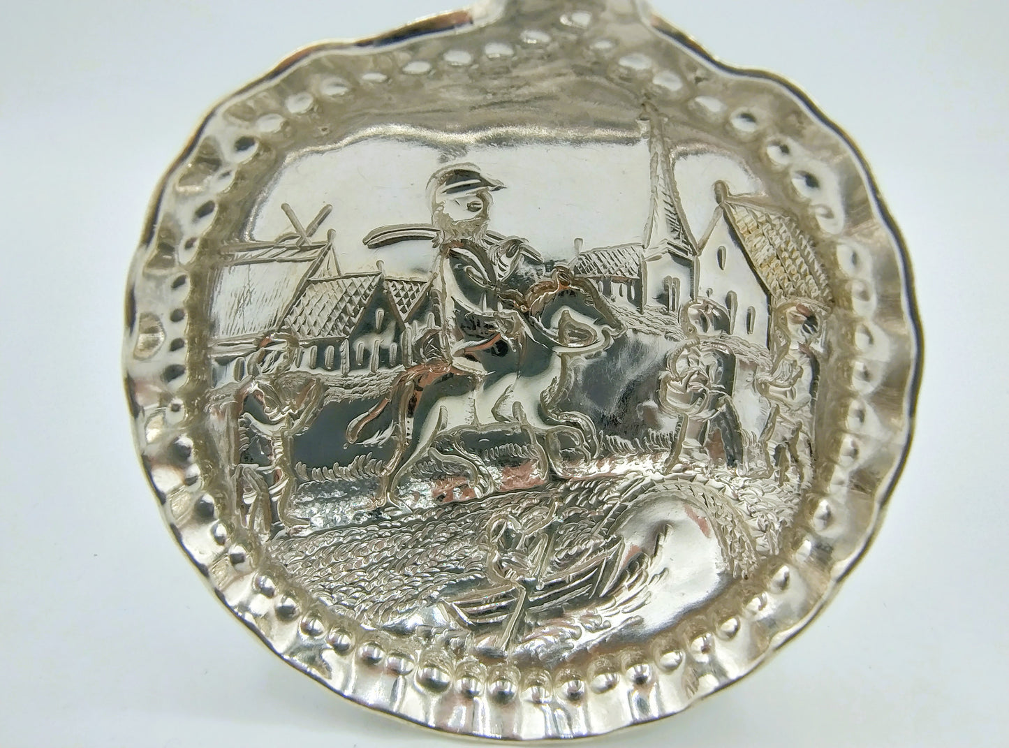 Silver cream spoon, 19th century