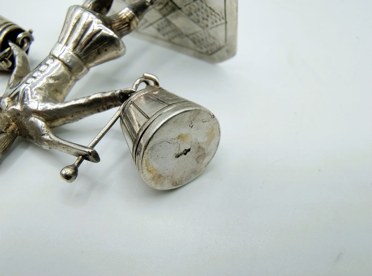 Silver miniature, man with yoke, J.S. Zwanenburg, Sneek, 1900-1953