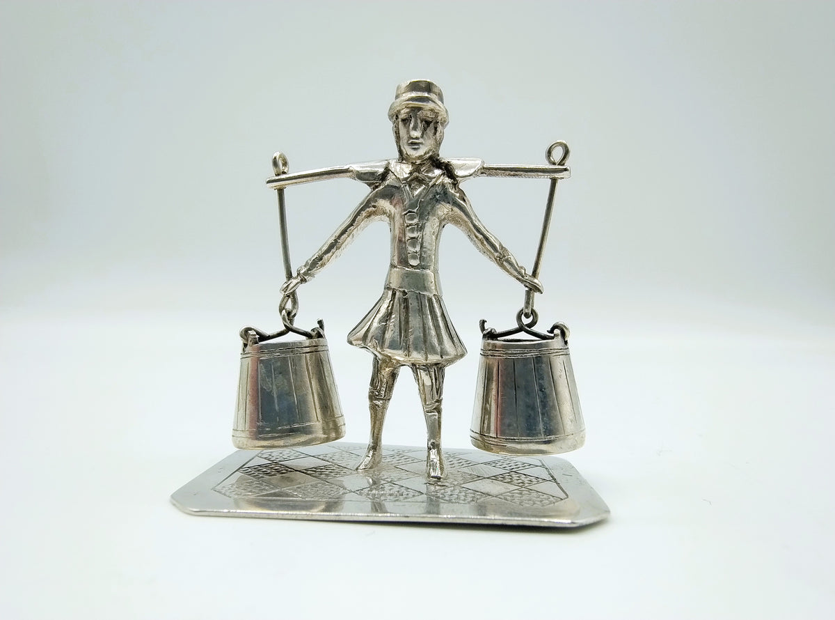 Silver miniature, man with yoke, J.S. Zwanenburg & Son, Sneek, 1864-1900