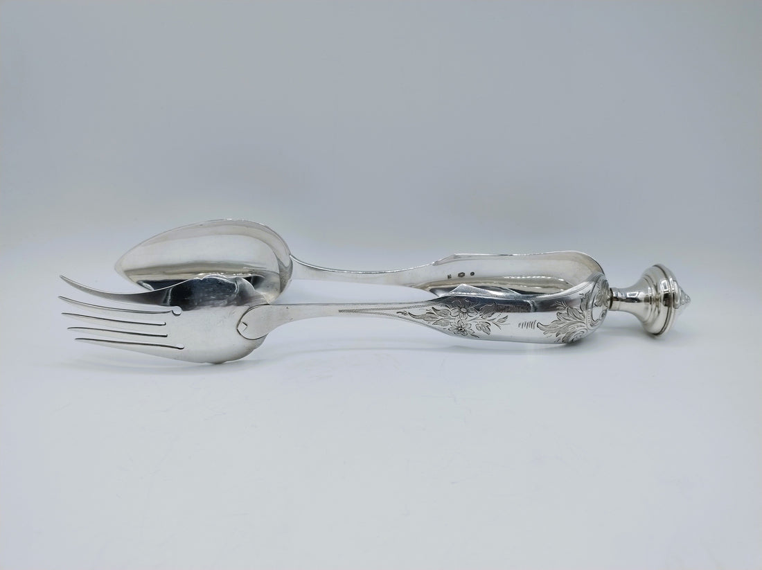 Zilveren saladetangen uit de 19e eeuw: elegant tafelzilver met geschiedenis