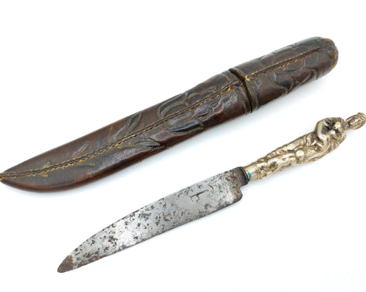 Schager knife with silver handle in leather sheath, 17th century.