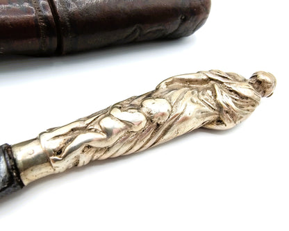 Schager knife with silver handle in leather sheath, 17th century.