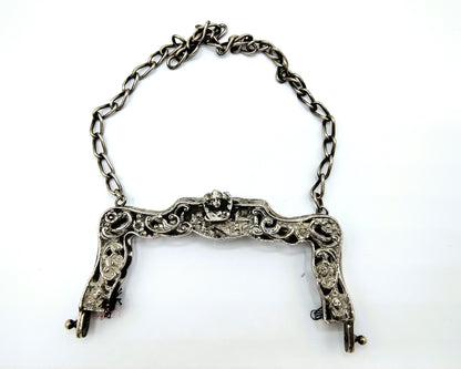 Cast silver bag bracket, Schoonhoven, 20th century.