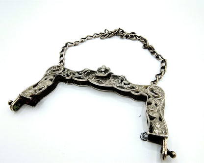 Cast silver bag bracket, Schoonhoven, 20th century.