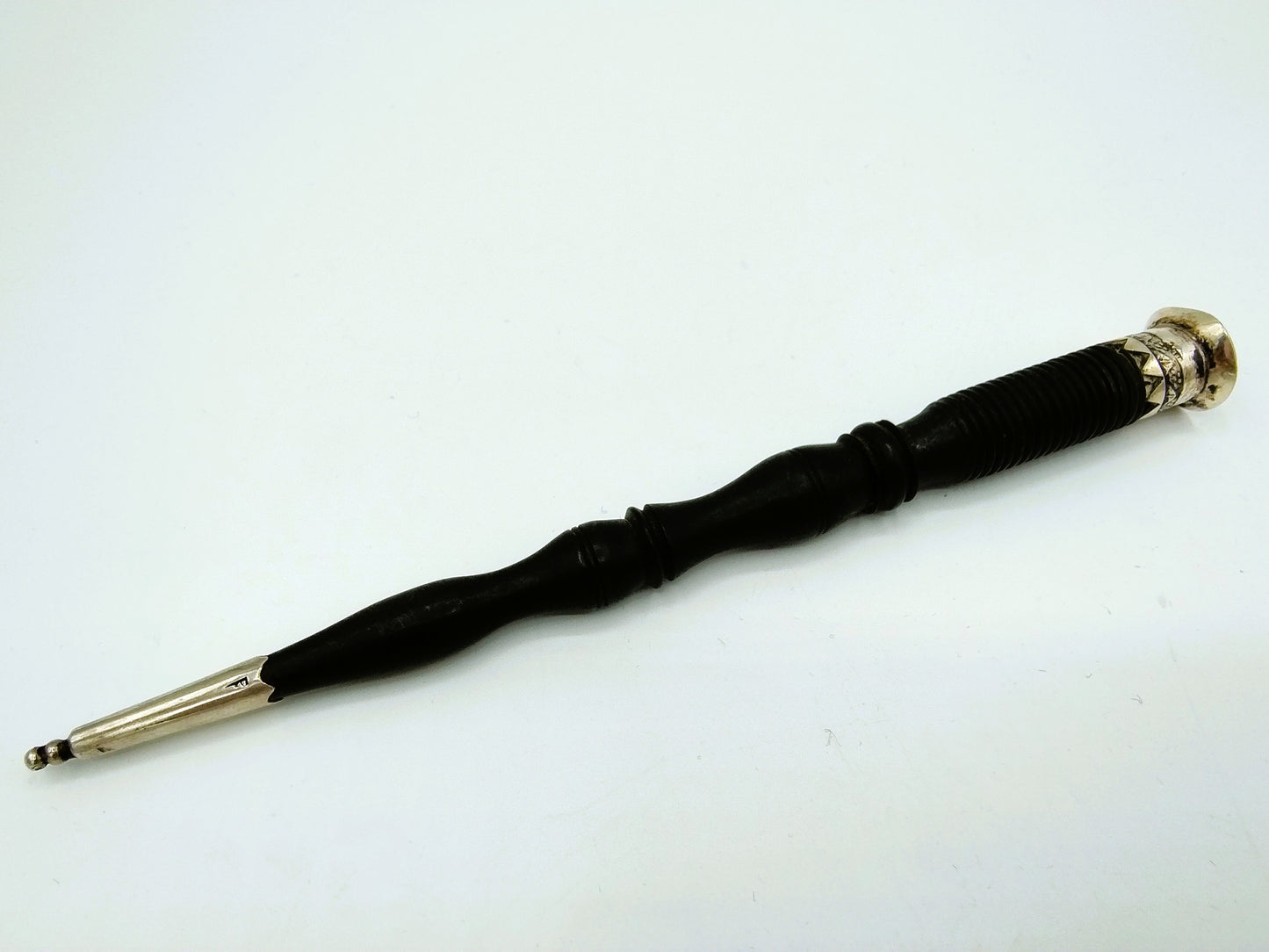 Ebony knitting needle holder with silver fittings, 19th century