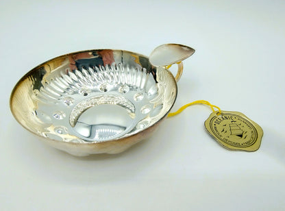 Silver wine tasting dish, France, 20th century