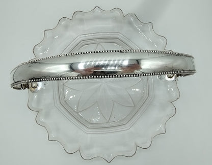 Crystal bowl with silver handle, 19th century.