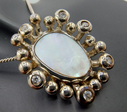 Gold-plated silver pendant with mother of pearl and 6 zirconias