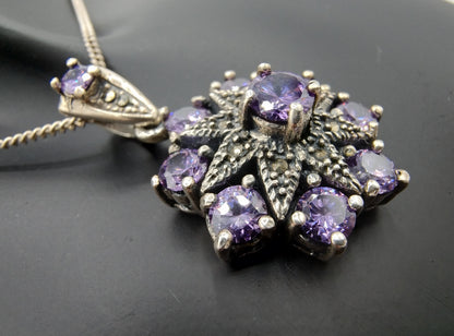 Silver pendant set with Amethyst (?)