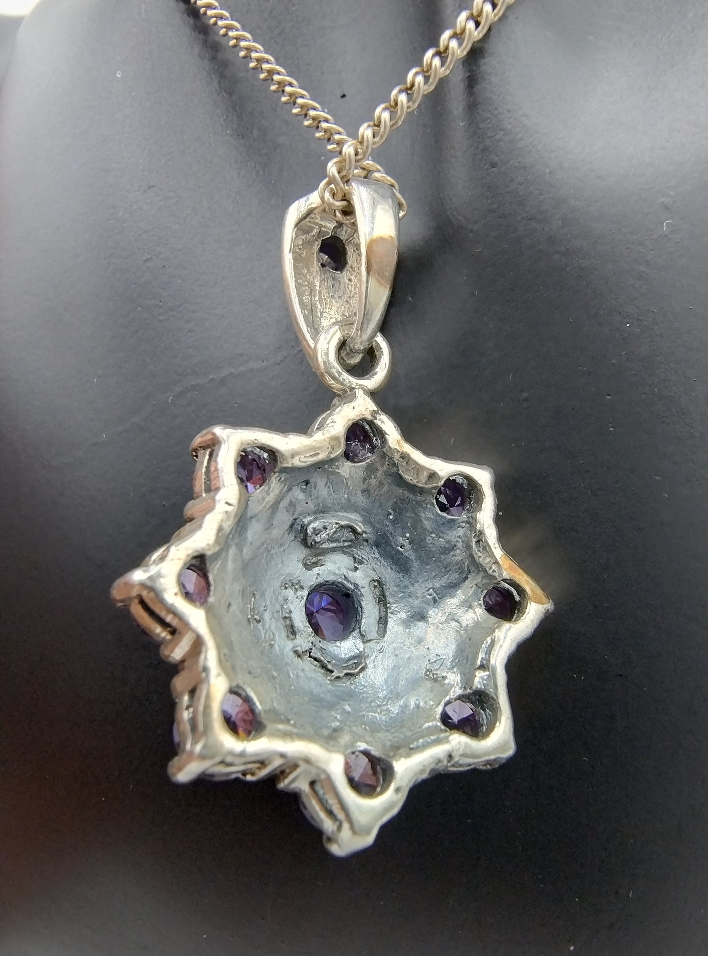 Silver pendant set with Amethyst (?)