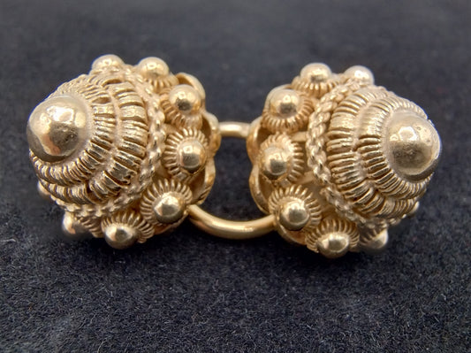 Silver throat buttons, gold plated, 19th century