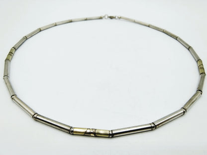 Silver chain with gold links on metal, 925/585