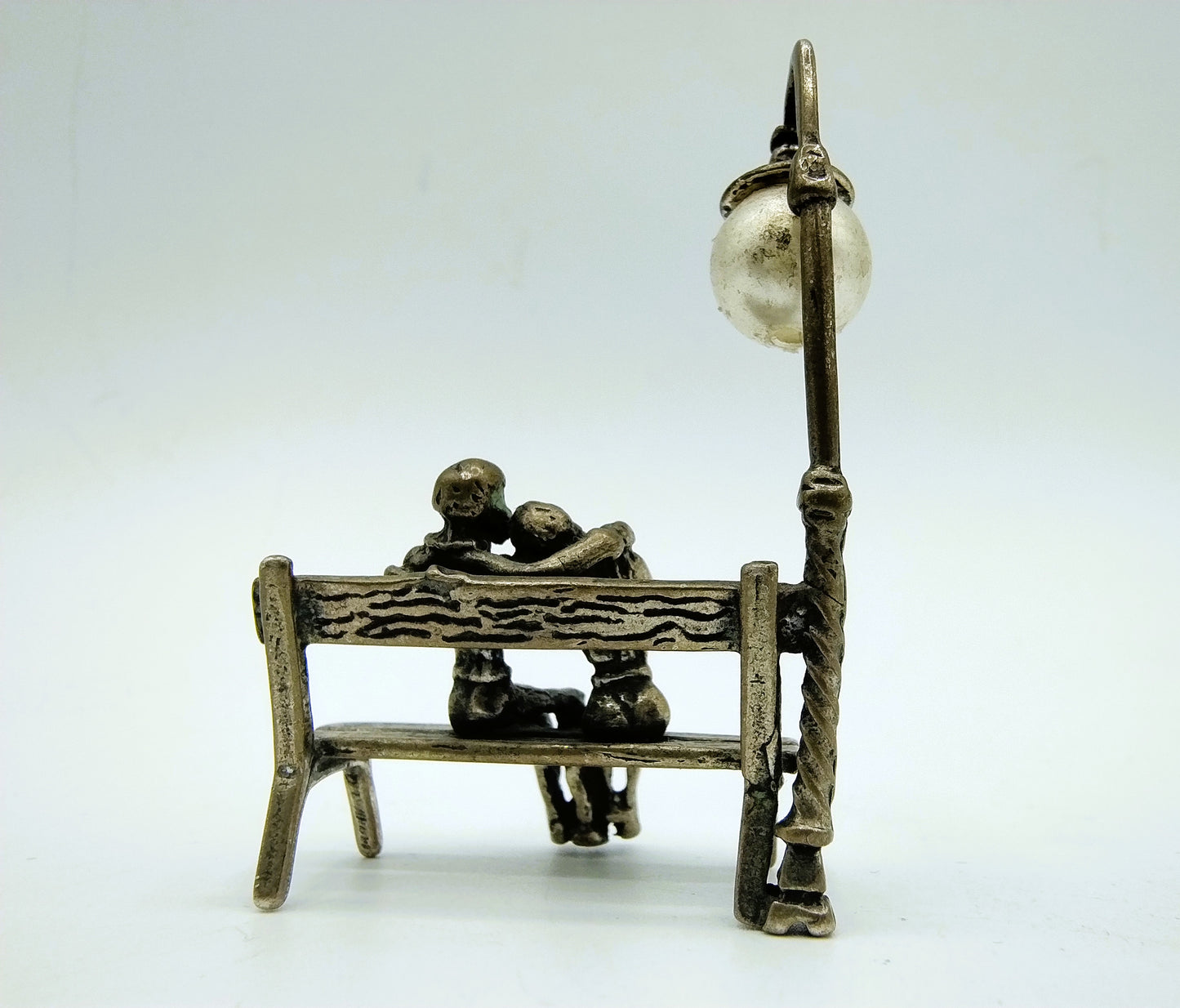 Silver miniature, couple in love on sofa, Italy, 800