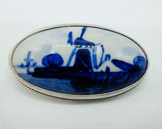 Silver brooch, Delft blue, 835