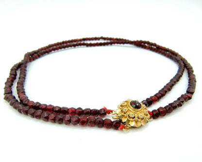 Glass garnet necklace with gold clasp, 20th century