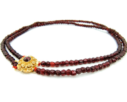 Glass garnet necklace with gold clasp, 20th century