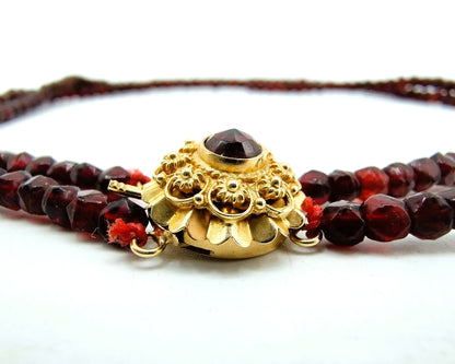 Glass garnet necklace with gold clasp, 20th century