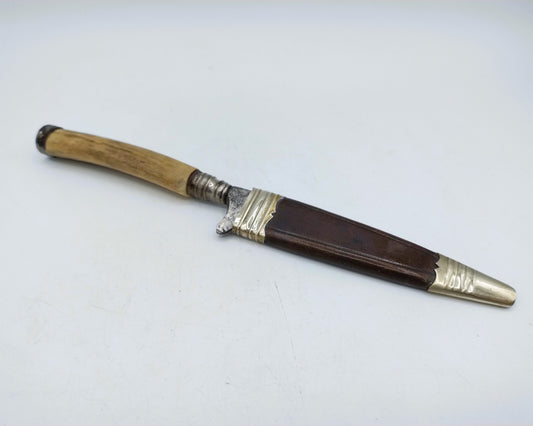 Hunting knife in leather sheath with silver fittings, 19th century