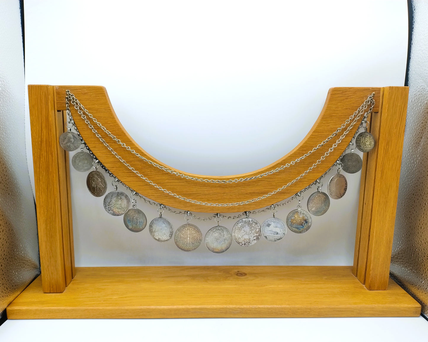 Display cabinet with 15 antique German coins, 16th to 19th century